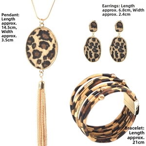 Three-piece leopard print jewelry set with tassel necklace, earrings, and braided bracelet