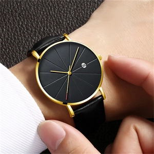 Macro detail of quartz watch with black dial, gold case, date window, and red second hand