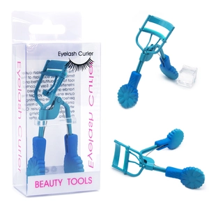Blue dual-tone eyelash curler with floral plastic handle and protective clear packaging box