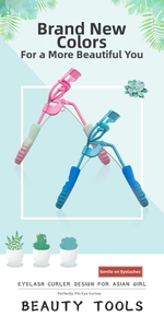 Detail of pink and blue eyelash curlers showing ergonomic handles and eye contour fitting