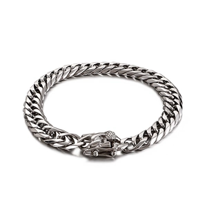Polished silver stainless steel cuban curb chain bracelet with decorative box clasp