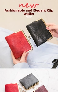 Detail of vintage textured leather clasp wallet with metallic frame and zipper pocket