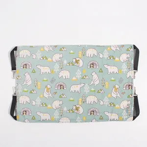 Detail of hanging cat hammock with polar bear pattern and sturdy metal hooks