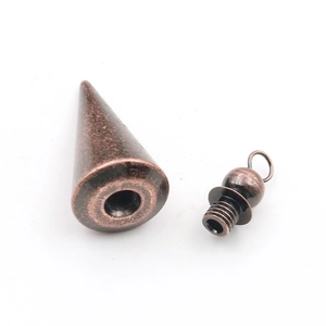 Detailed macro view of bronze conical pendulum pendant with threaded screw cap lid