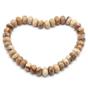 Macro view of natural Picture Jasper heishi beads for DIY jewelry making accessories