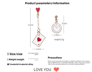 Asymmetric earrings set with poker cards and clock pendant on a clean white background