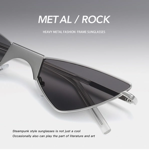 Detail view of steampunk silver metal sunglasses with dark grey lenses and rock aesthetics