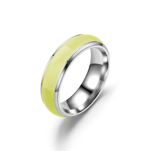 Detail view of a stainless steel luminous ring with light green enamel inlay