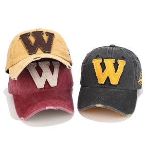 Three distressed baseball caps with W patch in yellow, burgundy and grey for outdoor wear
