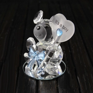 Detail of crystal baby bear figurine with blue heart and It's a boy engraved sign