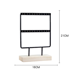 Black metal earring display stand with wooden base, height 21cm and width 16cm