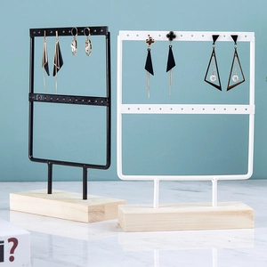 Dual earring organizers in black and white iron frames on solid pine wood bases