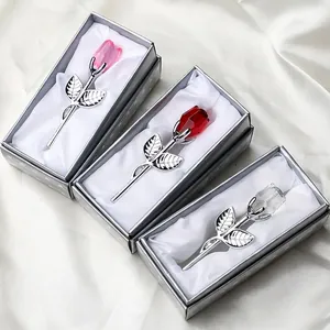 Elegant crystal metal roses in pink, red, and clear colors with silver stems and gift boxes