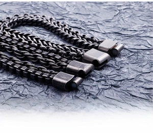 Detail of four vintage stainless steel chains with secure magnetic clasps for men