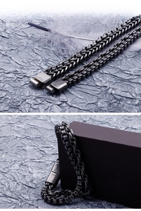 Detailed macro of vintage double-layer stainless steel men's chain with a square clasp