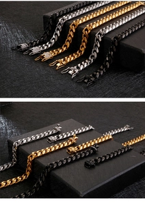 Detailed view of gold, silver, and black iced-out Cuban link bracelets in gift boxes