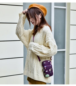Mini sac bandoulière vertical violet avec imprimé cartoon et double compartiment zippé