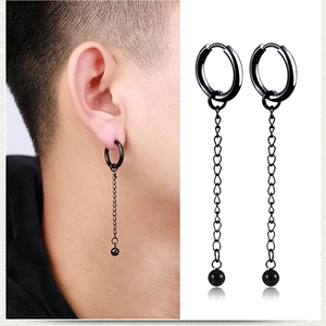 Detail of black titanium steel tassel chain hoop earring for men with ball pendant