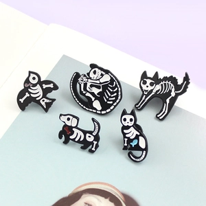 Five-piece set of Gothic animal skeleton enamel pins featuring dogs, cats, and birds