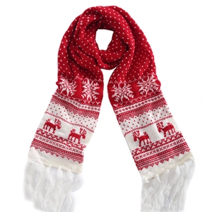 Red and white Christmas knit scarf with reindeer patterns, snowflakes and tassels