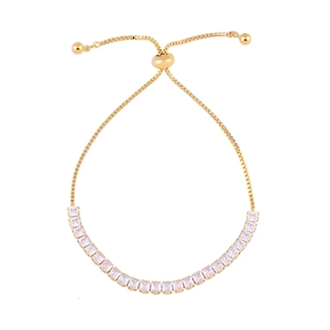 Detail of adjustable gold slider bracelet with square-cut clear cubic zirconia stones