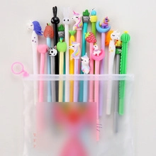 Detail view of transparent pencil case with various colorful cartoon silicone gel pens