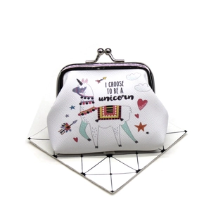 Detail of cute llama unicorn coin purse with kiss-lock closure and fabric texture