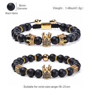 Set of two 8mm matte black stone bracelets with gold crown charms for men and women