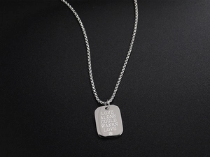 Detailed close-up of a silver titanium steel necklace featuring a square love letter pendant