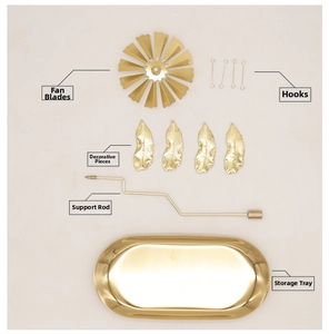 Golden rotating candle holder kit with sunflower blade, feather charms, tray and metal rod