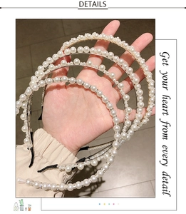 Detail view of four handcrafted pearl headbands with rhinestone accents and gold metal wire