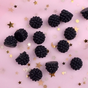 Black resin blackberry charms for DIY craft phone cases on pink starry background