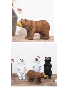 Figurines d'ours en bois sculpté à la main en finitions marron, noir et blanc