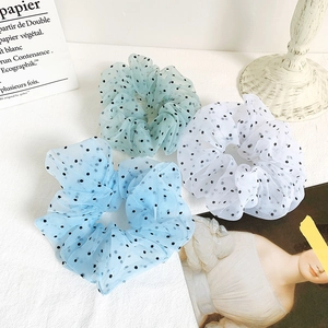 Three oversized French vintage polka dot organza scrunchies in blue, green and white
