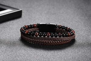 Detail of 6mm tiger eye stone beads and braided brown leather bracelet with magnetic clasp