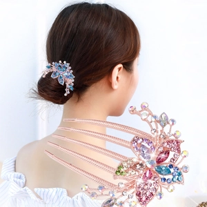 Sparkling crystal butterfly hair comb in rose gold finish for elegant updos