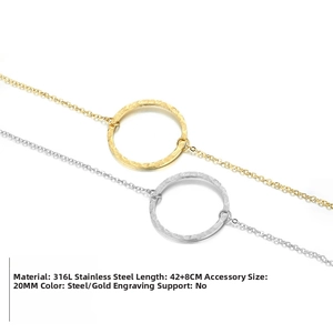 Close-up of gold and steel circular pendants with hand-hammered texture on 316L necklaces