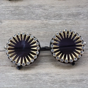 Retro round sunglasses with gold rivets and sparkling crystal rhinestones for a punk look