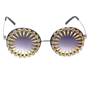Vintage round sunglasses with purple gradient lenses and gold rhinestone spiked frames