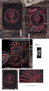 Detailed close-up of wine red vintage PU leather notebook with embossed Indian chief design