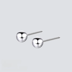 Detailed view of 5mm 316L stainless steel ball stud earrings in polished silver finish