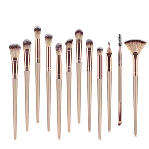 Detailed view of 12-piece champagne gold makeup brush set with gradient fiber bristles