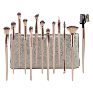 Macro shot of 12-piece makeup brush set with rose gold ferrules and silver glitter pouch