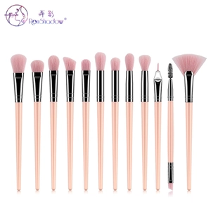 Detail view of 12-piece pink makeup brush set with silver ferrules and long handles