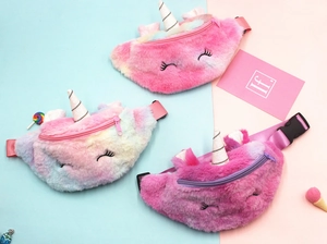 Detailed view of plush unicorn waist bags with colorful fur and adjustable nylon straps