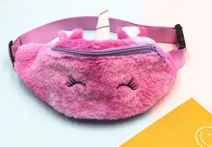 Close-up of pink plush unicorn waist bag featuring silver horn and eyelash embroidery