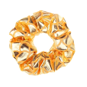 Golden fish scale pattern scrunchie with metallic luster fabric on white background