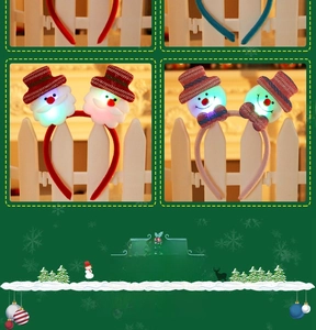 Detail view of plush LED Christmas headbands with Santa and snowman glowing ornaments