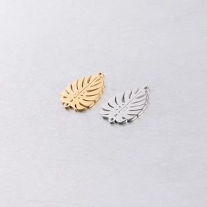 Mirror polished stainless steel monstera leaf pendants in gold and silver colors