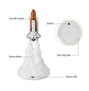 Detail view of shuttle lamp showing switch, flame effect, and micro USB port